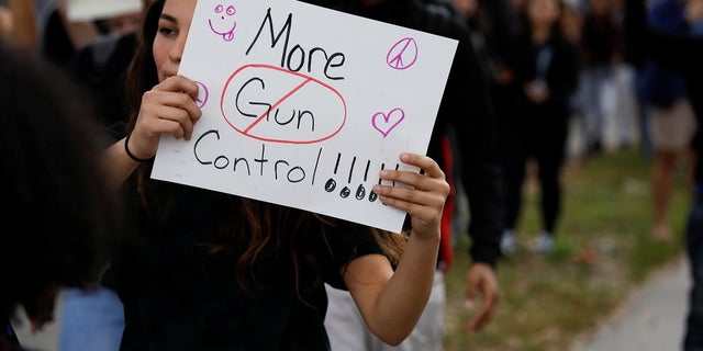In this February 2018 photo, students from Plantation High School protest in support of gun control following at mass shooting at Marjory Stoneman Douglas High School. On Wednesday, students and parents from Broward County School district met for a forum on school safety.