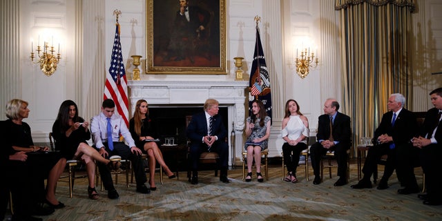President Trump hosted teachers and students who have been victims of school shootings, along with their parents, at the White House for a listening session in February 2018.