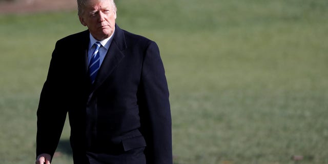 FILE -- President Donald Trump walks as he returns to the White House after a trip to Lewisburg, West Virginia, in Washington D.C., April 5, 2018.