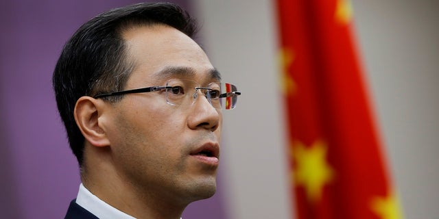 Gao Feng, a spokesman for China's Ministry of Commerce, addresses reporters in Beijing, April 6, 2018.