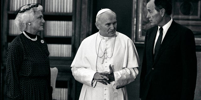 Vice President George Bush and his wife Barbara with Pope John Paul II during an audience at the Vatican, June 24, 1985.