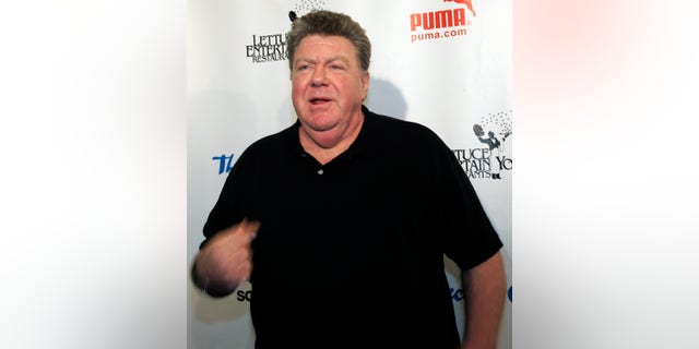 Actor George Wendt gestures as he arrives for celebrations marking the 50th anniversary of improv theater, The Second City, in Chicago December 12, 2009. REUTERS/Frank Polich (UNITED STATES - Tags: ENTERTAINMENT SOCIETY) - RTXRSJA
