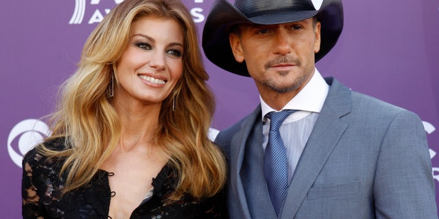 Singer Faith Hill and her husband Tim McGraw arrive at the 48th ACM Awards in Las Vegas April 7, 2013.