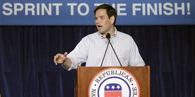 In this file photo, then-Senate candidate Marco Rubio speaks to supporters during a Republican National Committee rally in Orlando Oct. 23, 2010.