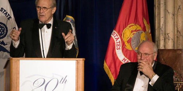 Oct. 21, 2009: Former Defense Secretary Donald Rumsfeld speaks as former Vice President Dick Cheney listens at the Center For Security Policy dinner in Washington, D.C. (AP Photo)