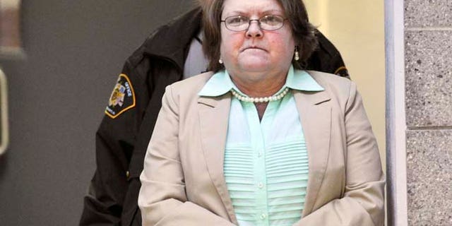 March 10, 2015: Joyce Hardin Garrard walks to the Etowah County Judicial Building from the Etowah County Detention Center in Gadsden, Ala. (AP/AL.com, Frank Couch)