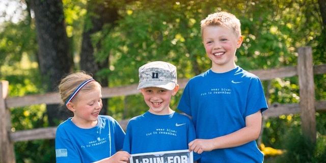 John and Lisa Hallett's children, Heidi, Bryce and Jackson, are seen here after a Memorial Day road race. 