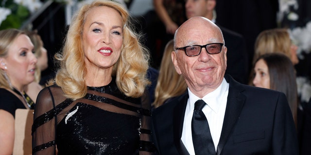 Model Jerry Hall and Rupert Murdoch arrive at the 73rd Golden Globe Awards in Beverly Hills, California January 10, 2016.  REUTERS