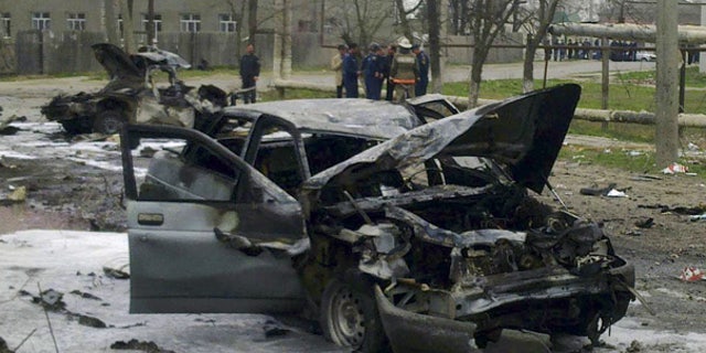 Twin Homicide Blasts Kill 12 In Russia's South 