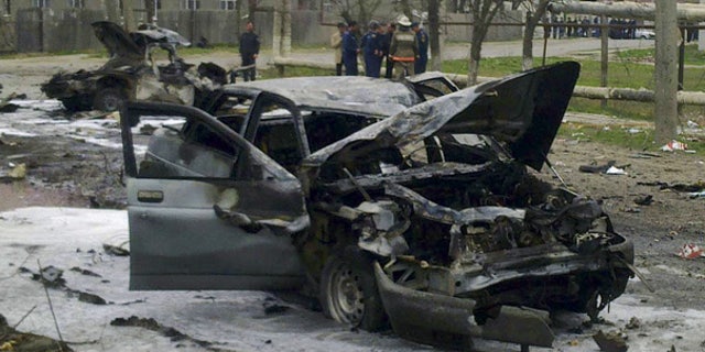 Mar. 31: Destroyed cars are seen after a homicide blast in Kizlyar, southern Russia.