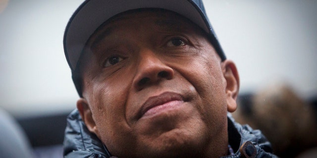 Russell Simmons speaks at a news conference along with members of Justice League NYC to present a list of demands at City Hall in New York December 10, 2014.