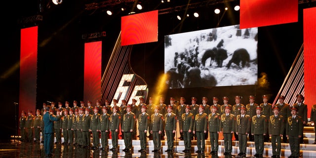 In this photo taken on Thursday, March 31, 2016, the Alexandrov Ensemble choir performs during a concert in Moscow, Russia. A Russian plane with 92 people aboard, including the well-known military band, crashed into the Black Sea on its way to Syria on Sunday, Dec. 25, minutes after takeoff from the resort city of Sochi, the Defense Ministry said. The Tu-154, which belonged to the ministry, was taking the Alexandrov Ensemble to a concert at the Russian air base in Syria. (AP Photo)