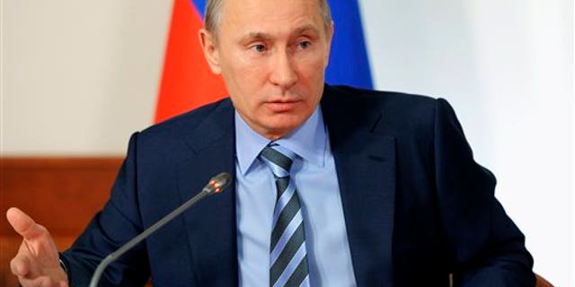 Dec. 27, 2011: Russian Prime Minister Vladimir Putin meets supporters in Moscow. Putin, who is running to reclaim the presidency, says he wants the vote in March to be absolutely transparent.