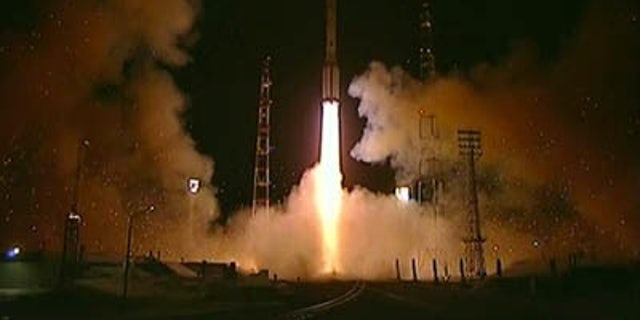 A Russian Proton rocket launches toward space carrying the Telkom 3 and Express MD2 satellites on Aug. 6, 2012 from Baikonur Cosmodrome in Kazakhstan. The rocket suffered a third stage failure during the ill-fated mission.