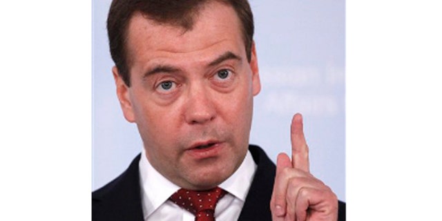 De Russische president Dmitry Medvedev spreekt op de Russische Raad Internationale Zaken in Moskou op 23 maart 2012.