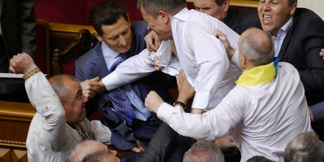May 24, 2012: Lawmakers from pro-presidential and oppositional factions fight in the parliament session hall in Kiev, Ukraine.