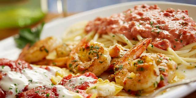 The Southern Tour of Italy features spicy pesto shrimp, cheese-filled mezzaluna and bucatini topped with spicy tomato bacon sauce.