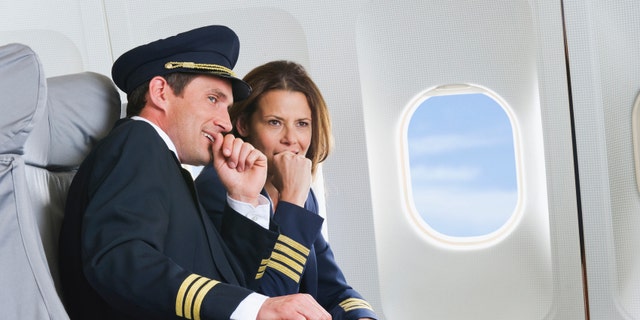 Flight personnel on airplane
