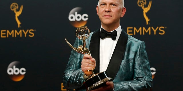 Producer Ryan Murphy poses backstage with the award for Outstanding Limited Series for "The People v. O.J. Simpson: American Crime Story" at the 68th Primetime Emmy Awards in Los Angeles, California U.S., September 18, 2016. REUTERS/Mario Anzuoni - RTSOCPY