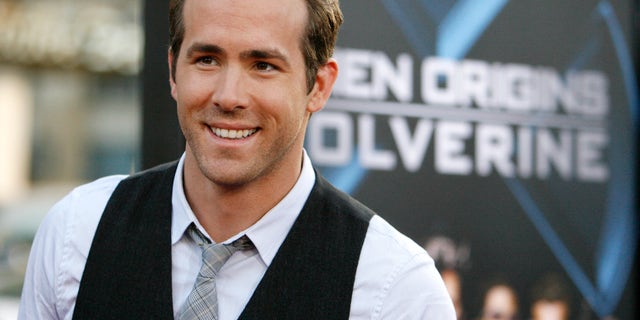 Cast member Ryan Reynolds arrives at an industry screening of "X-Men Origins: Wolverine" at the Grauman's Chinese theatre in Hollywood, California April 28, 2009. The movie opens in the U.S. on May 1. REUTERS/Mario Anzuoni (UNITED STATES ENTERTAINMENT) - RTXEIJX