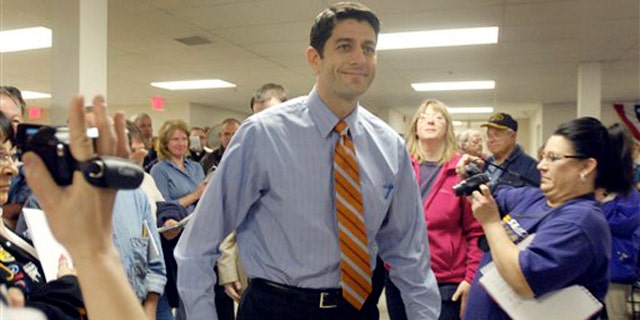 Rep. Paul Ryan arrives at a town hall meeting April 28 in Waterford, Wis.