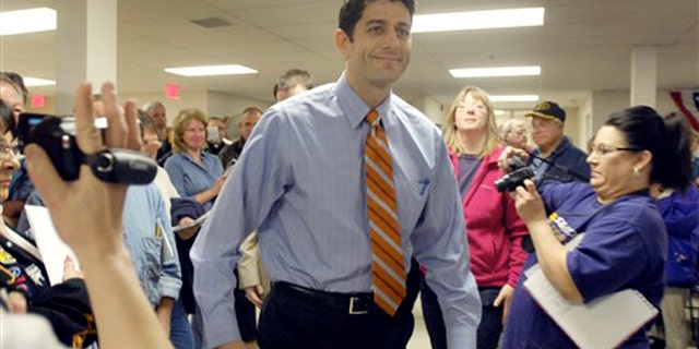 Rep. Paul Ryan arrives at a town hall meeting April 28 in Waterford, Wis.
