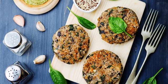 vegan quinoa eggplant spinach chickpeas Burger. toning. selective focus