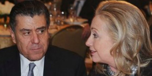 Haim Saban, (l.), has given $3.5 million to the presidential campaign of Hillary Clinton, (r.). (Reuters)