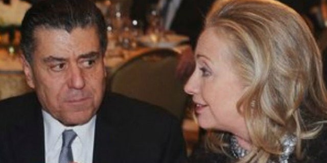 Haim Saban, (l.), has given $3.5 million to the presidential campaign of Hillary Clinton, (r.). (Reuters)