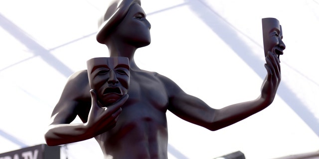 FILE - This Jan. 29, 2017 file photo shows a giant replica of The Actor statue on the red carpet at the 23rd annual Screen Actors Guild Awards in Los Angeles. The 2018 SAG Awards nominations for achievements in film and television will be announced on Wednesday, Dec. 13. (Photo by Richard Shotwell/Invision/AP)