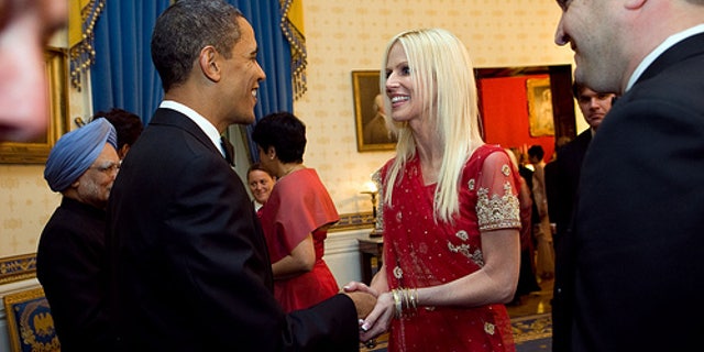 Nov. 24, 2009: President Barack Obama greets Michaele and Tareq Salahi during a receiving line in the Blue Room of the White House before the State Dinner with Prime Minister Manmohan Singh of India.