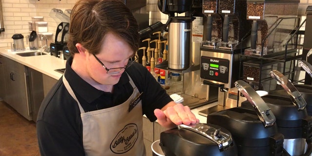 Sam Hazeltine making a cup of coffee.