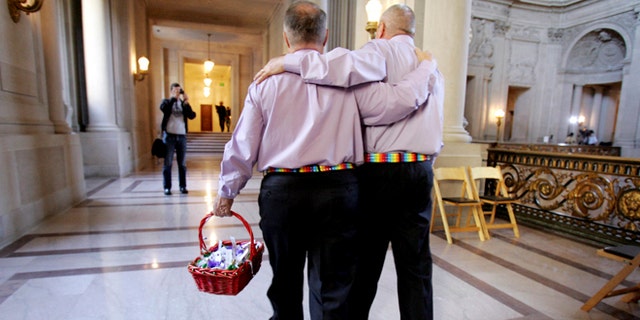 FILE 2008: A male couple inside San Francisco City Hall as they prepare to get married. San Francisco, Calif.