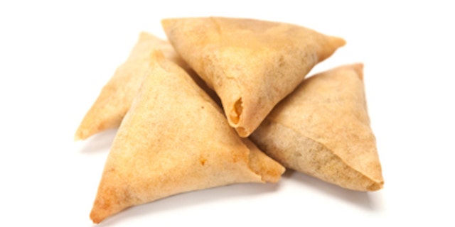 Witnesses told a local paper that samosas' ubiquitous three-cornered shape may invoke thoughts on the Holy Trinity