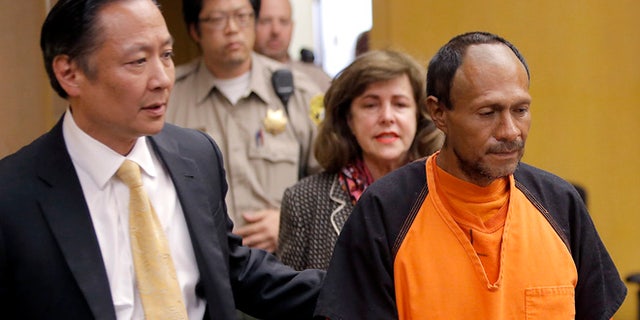 July 7, 2015: Francisco Sanchez, right, is lead into the courtroom for his arraignment at the Hall of Justice in San Francisco. He is accused of killing Kate Steinle, despite having been in police custody and ICE not having been notified of his release. (AP)