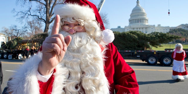 Nov. 26, 2012: Santa Claus and Mrs. Claus, portrayed by Gerald and Twila Morris of Meeker, Colo., greet visitors on Capitol Hill in Washington.