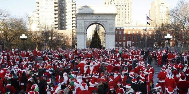 SantaCon revelers gathered in cities across the nation dressed en masse as jolly ol' St. Nick. (Reuters)