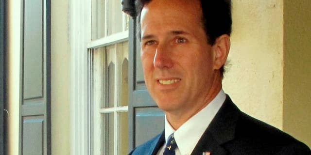 Former Pa. Sen. Rick Santorum leaves a speaking engagement in Charleston, S.C., on Monday, Dec. 6, 2010. The Republican was wrapping up a two-day visit to Charleston as part of his seventh trip to the state before South Carolina's first-in-the-South GOP primary in 2012. (AP Photo/Bruce Smith)