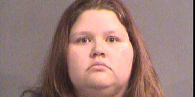 Sarah Hopkins' booking photo. (Segdwick County Jail)