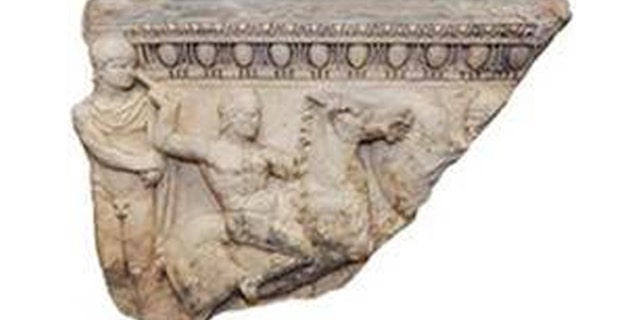 This sarcophagus fragment was stolen 30 years ago. (Manhattan District Attorney's Office)