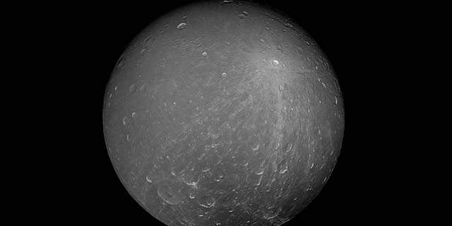 NASA's Cassini spacecraft captured this image of the Saturn moon Dione on July 23, 2012.