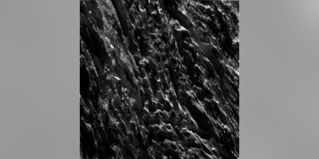 This unprocessed view of Saturn's moon Enceladus was acquired by NASA's Cassini spacecraft during a close flyby of the icy moon on Oct. 28, 2015.