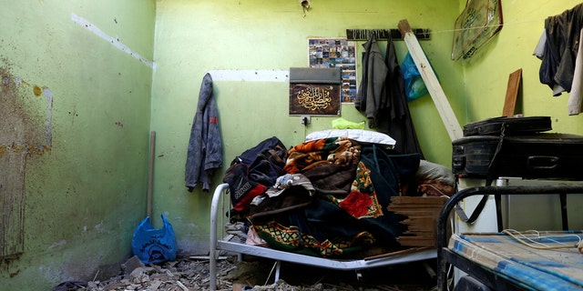 Damage created by debris is seen, after ballistic missiles fired by Yemen's Houthi militia fell at a house in Riyadh, Saudi Arabia, March 26, 2018.