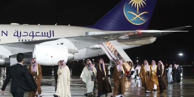 Members of the Saudi Arabian delegation disembark from a plane upon their arrival at Vnukovo airport outside Moscow, Russia October 4, 2017. REUTERS/Sergei Karpukhin - UP1EDA41CWL4L