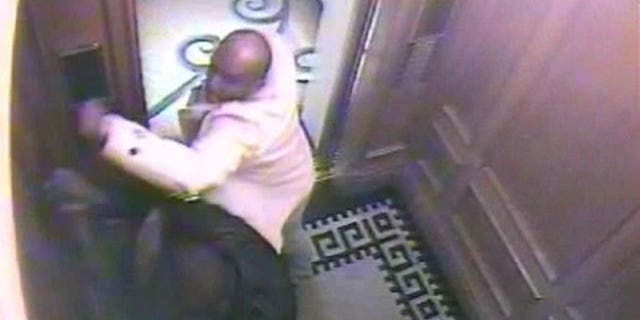 In this CCTV handout image issued by the Metropolitan Police, Saudi Arabian Prince Saud, in white jacket, attacks his servant, Bandar Abdulaziz, in a lift. A Saudi prince has been convicted in Britain of murdering a servant. A jury in London's Old Bailey criminal court, on Tuesday Oct. 19, 2010, found Prince Saud Abdulaziz bin Nasser al Saud guilty of murdering Bandar Abdullah Abdulaziz in a frenzied attack in a hotel. The 34-year-old prince faces a possible life sentence.