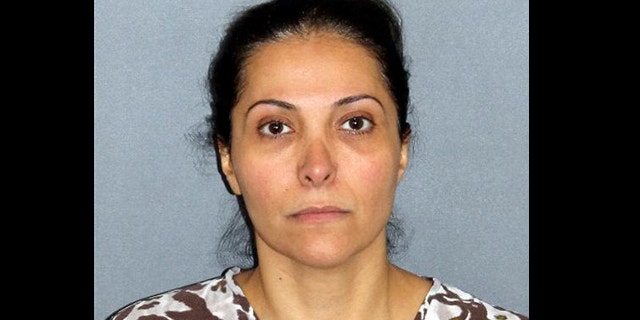 UNDATED: This image provided by the Irvine Police Department shows Meshael Alayban, who was arrested July 9, 2013 in Irvine, Calif., for allegedly holding a domestic servant against her will.