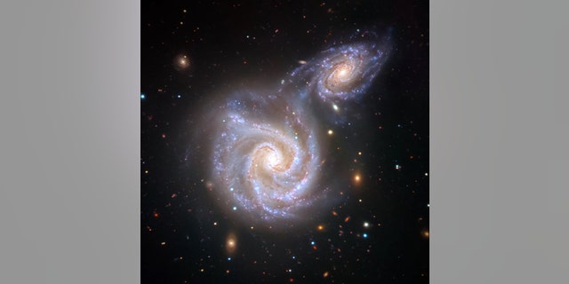 An artistic visualization of the collision between the Milky Way galaxy and the Sausage galaxy, which likely happened between 8 billion and 10 billion years ago. Credit: V. Belokurov (Cambridge, U.K.; and CCA, New York, U.S.) based on the image by ESO/Juan Carlos Muñoz