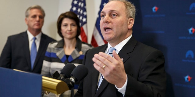 Nov. 18, 2014: House Majority Whip Steve Scalise of La., right, with House Majority Leader Kevin McCarthy of Calif., left, and Rep. Cathy McMorris Rodgers, R-Wash., speaks to reporters on Capitol Hill in Washington.