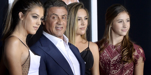 Cast member/producer Sylvester Stallone (2nd L) poses with his daughters Sistine Rose, Sophia Rose and Scarlet Rose (L-R) pose during the premiere of the film "Creed" in Los Angeles, California November 19, 2015. The film opens in the U.S. on November 25. REUTERS/Kevork Djansezian - RTS8254