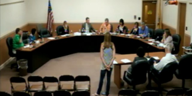 Valerie Kaufman, center, told the Marlboro Township Board of Education during a June 12 meeting that she found the pledge to be unconstitutional and suggested administrators “do away” with the practice. (Marlboro Township Public Schools)